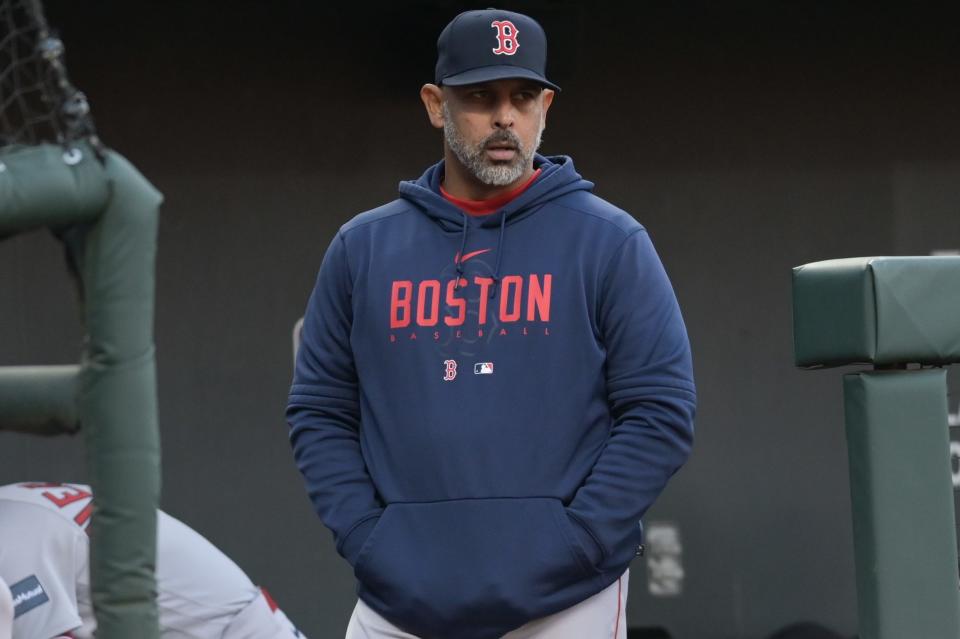 Red Sox manager Alex Cora looks on from the dugout during Boston's game against the Orioles at Oriole Park at Camden Yards in Baltimore on April 24, 2023.