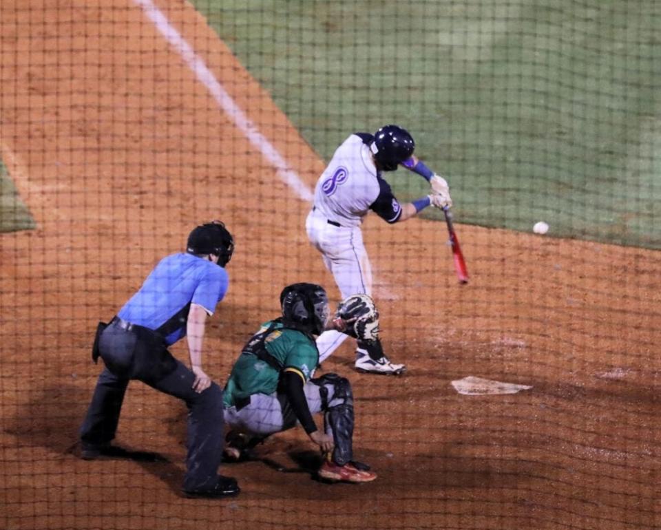 Rockabilly's Outfielder Garrett Byrd (8), from Martin, Tennessee, and a former player at Jackson State Community College, hit the ball during the inaugural game of the 2023 season for the Jackson Rockabillys Baseball team against the Cape Girardeau Catfish.