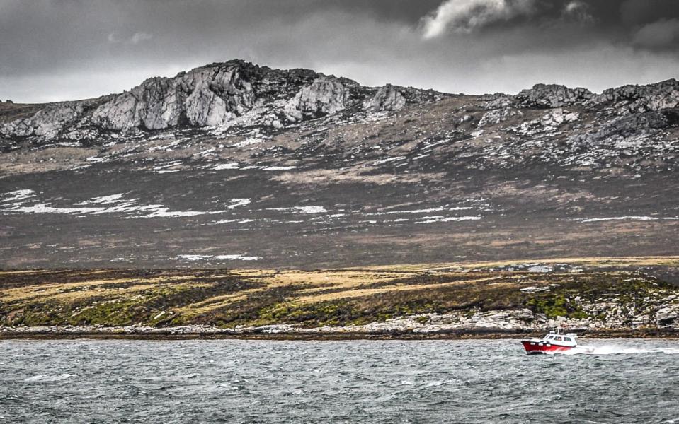 A boat scours the shore - Getty