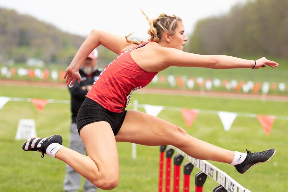 Colonel Crawford alumna Cassidy Vogt clears a hurdle while competing for the University of Rio Grande.