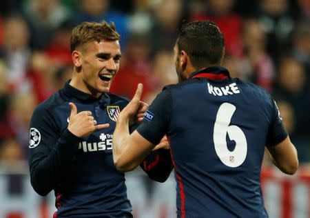 Britain Football Soccer - Bayern Munich v Atletico Madrid - UEFA Champions League Semi Final Second Leg - Allianz Arena, Munich - 3/5/16. Antoine Griezmann celebrates scoring the first goal for Atletico Madrid with Koke. Reuters / Michaela Rehle