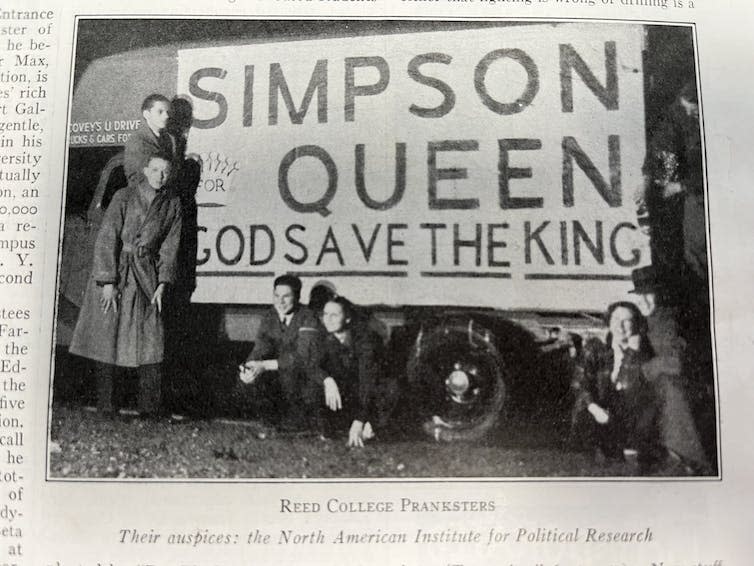 A group of American students with a banner calling for Wallis Simpson to be allowed to be Queen of England.