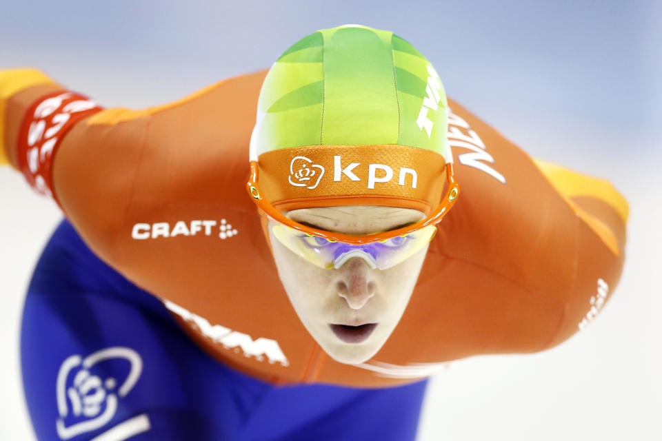 Netherlands' Ireen Wust competes in the women's 3000-meter race during the World Championship allround speedskating at Thialf skating arena in Heerenveen, northern Netherlands, Saturday, March 22, 2014. (AP Photo/Vincent Jannink)