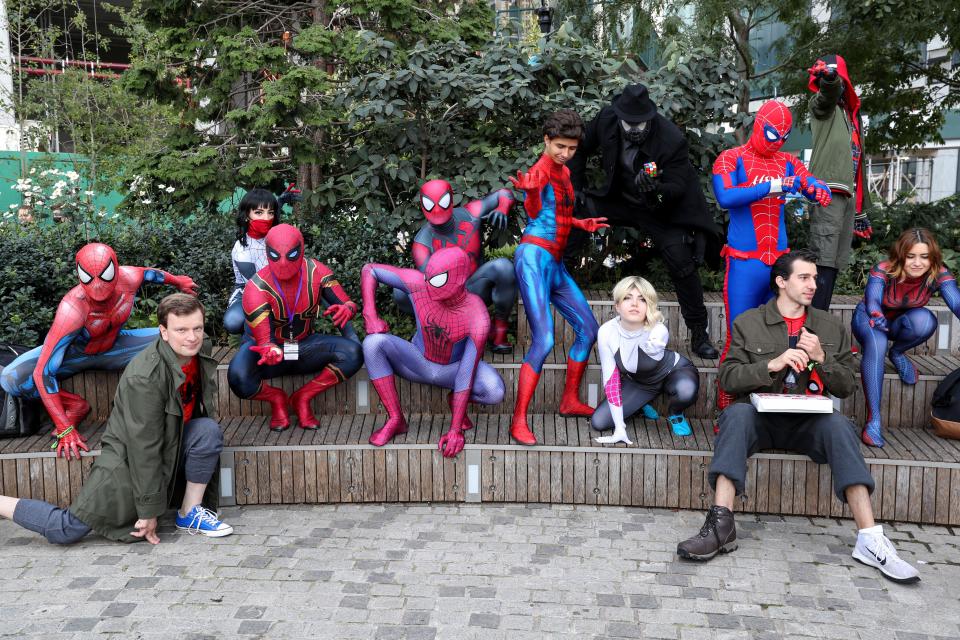 Cosplayers dressed as different versions of Spider-Man during Day 2 of New York Comic Con 2021 at Jacob Javits Center on October 08, 2021 in New York City.