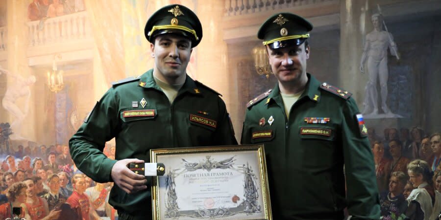 Niiaz Iliasov (left) in military uniform