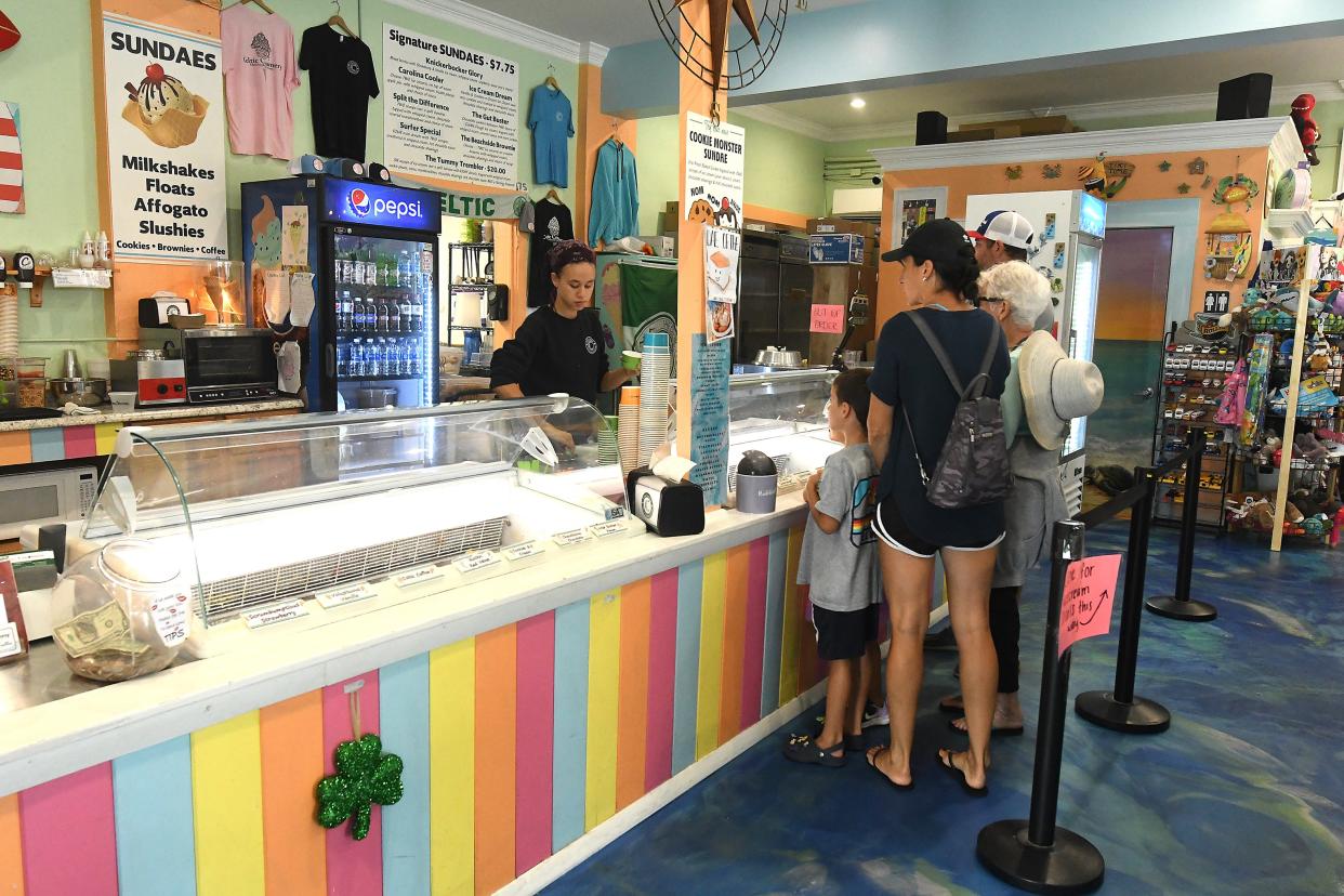 Hailey Baker waits on customers at Celtic Creamery Aug. 29, 2022 in Carolina Beach. KEN BLEVINS/STARNEWS