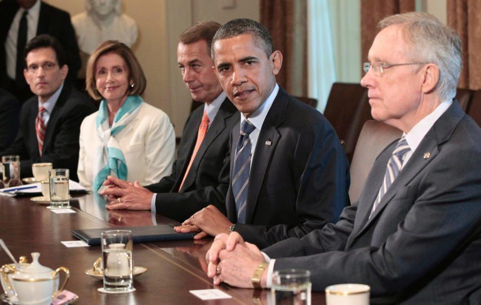 In this July 7, 2011 file photo, President Barack Obama meets with Congressional leadership in the Cabinet Room of the White House in Washington.