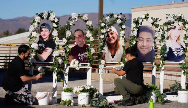 A memorial is seen for shooting victims Raymond Green Vance, 22; Ashley Paugh, 35; Daniel Aston, 28; Kelly Loving, 40; and Derrick Rump, 38.