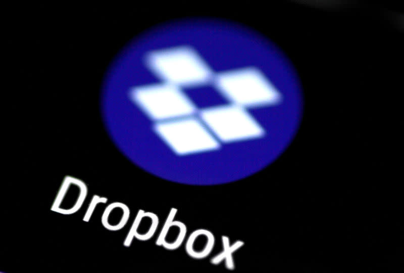 FILE PHOTO: The Dropbox app logo seen on a mobile phone in this illustration photo October 16, 2017. REUTERS/Thomas White/Illustration/File Photo