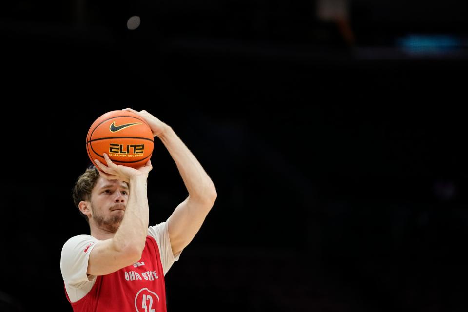 Oct 19, 2023; Columbus, Ohio, USA; Ohio State Buckeyes guard Colby Baumann (42) shoots during an open practice at Value City Arena.