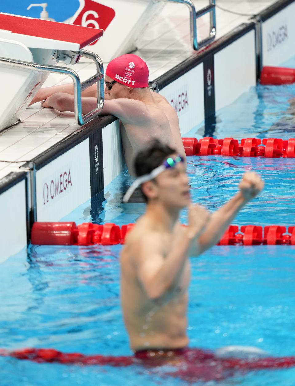 Duncan Scott reflects on another silver medal as China’s Wang Shun celebrates gold (Joe Giddens/PA) (PA Wire)