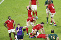 Players react following their Rugby World Cup Pool B game at Kobe Misaki Stadium between South Africa and Canada in Kobe, Japan, Tuesday, Oct. 8, 2019. (Kyodo News via AP)