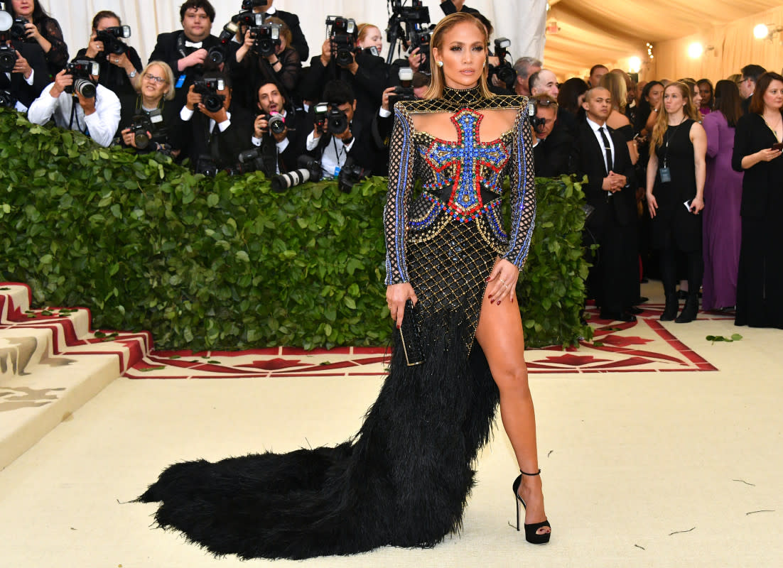 <p>Dia Dipasupil/WireImage</p><p>Jennifer Lopez was on theme in a big way at the <a href="https://parade.com/668594/paulettecohn/photos-the-best-from-the-2018-met-gala-red-carpet/" rel="nofollow noopener" target="_blank" data-ylk="slk:2018 Met Gala;elm:context_link;itc:0;sec:content-canvas" class="link rapid-noclick-resp">2018 Met Gala</a>, rocking a bejeweled cross bodice on her Balmain gown for the "Heavenly Bodies: Fashion and the Catholic Imagination" exhibition.</p>