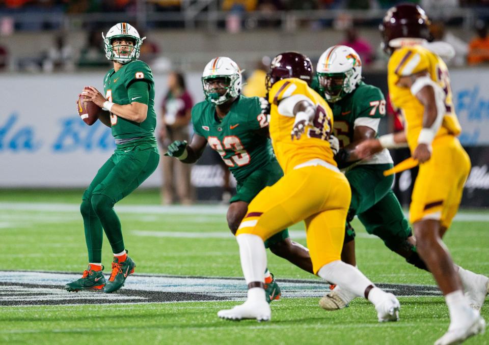 Florida A&M Rattlers quarterback Jeremy Moussa (8) looks to pass to a teammate. The Florida A&M Rattlers defeated the Bethune Cookman Wildcats 24-7 in the Florida Classic at Camping World Stadium on Saturday, Nov. 18, 2023.