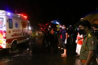 An ambulance carrying injured passengers leaves for a hospital after an Air India Express jet, which was carrying more than 190 passengers and crew from Dubai, crashed by overshooting the runway at Calicut International Airport in Karipur, Kerala, on August 7, 2020. - At least 14 people died and 15 others were critically injured when a passenger jet skidded off the runway after landing in heavy rain in India, police said on August 7. (Photo by Favas JALLA / AFP) (Photo by FAVAS JALLA/AFP via Getty Images)