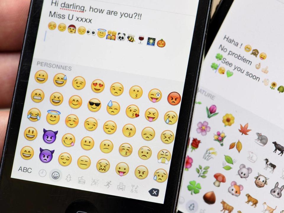 The smile emojis express more than just happiness – there are multiple nuances (AFP/Getty)