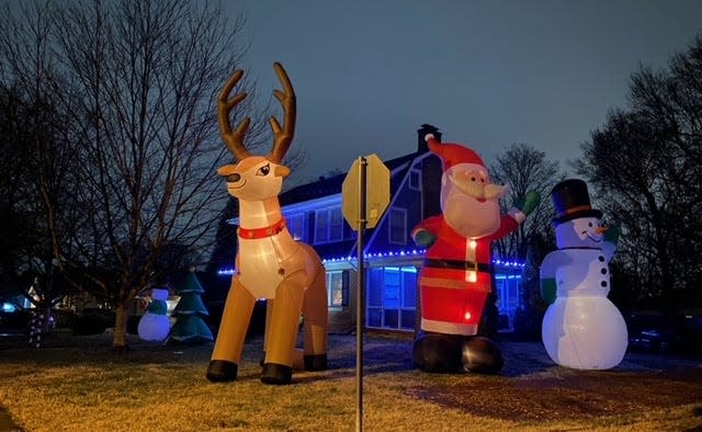 Brad Adams went big this year with three large inflatables, a reindeer, Santa Claus and snowman, nearly as tall as his home, located at 1057 E. Stanford St.