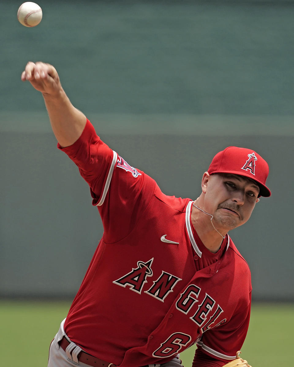 Los Angeles Angels starting catcher Janson Junk throws during the first inning of a baseball game against the Kansas City Royals Wednesday, July 27, 2022, in Kansas City, Mo. (AP Photo/Charlie Riedel)