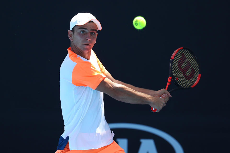 MELBOURNE, AUSTRALIA - JANUARY 21:  Ergi Kirkin of Turkey plays a backhand in his first round match against Olukayode Alafia Damina Ayeni of the United States during the Australian Open 2017 Junior Championships at Melbourne Park on January 21, 2017 in Melbourne, Australia.  (Photo by Ryan Pierse/Getty Images)