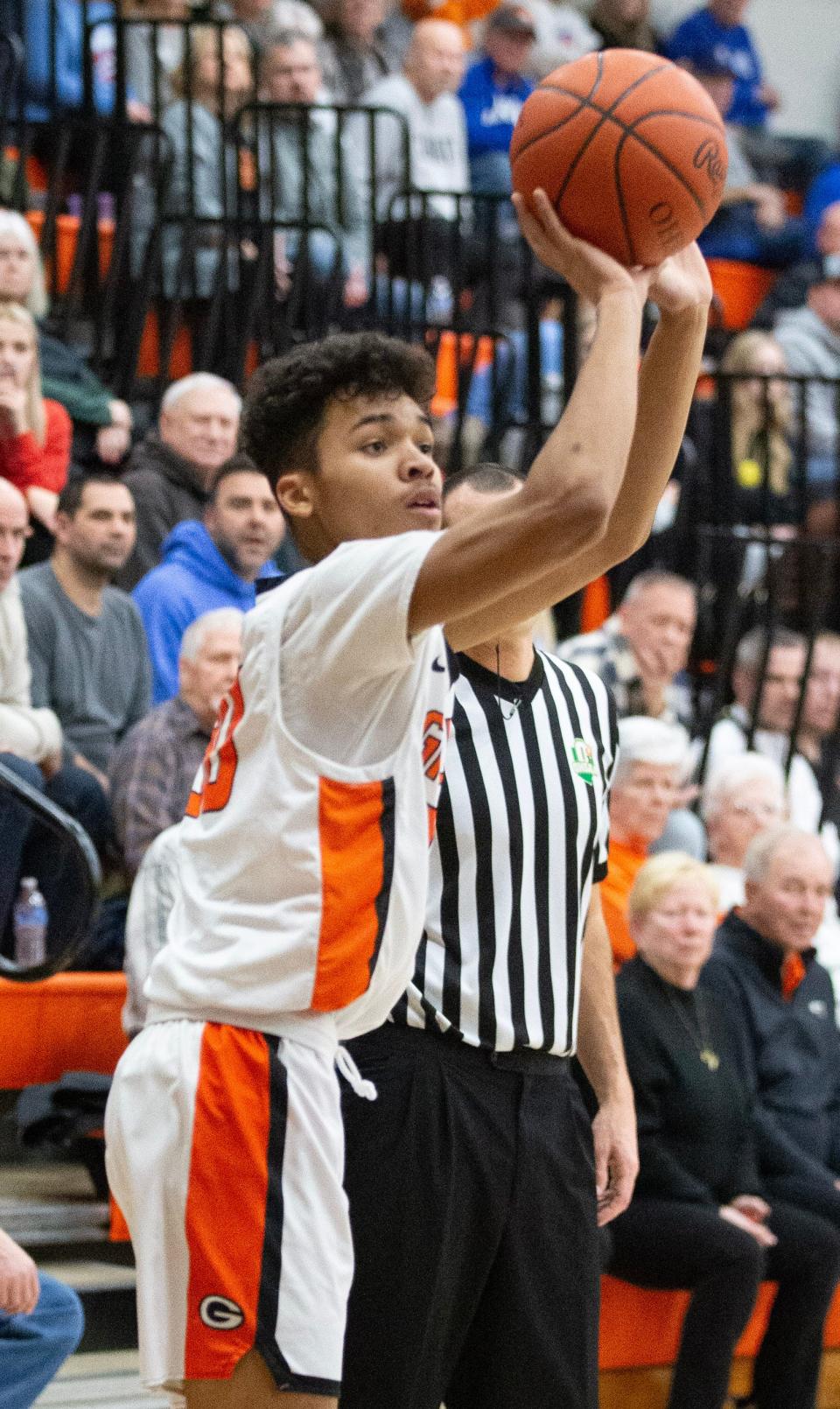 Green's Mark Danner shoots during a boys high school basketball game against Lake on Friday, Jan. 27, 2023.