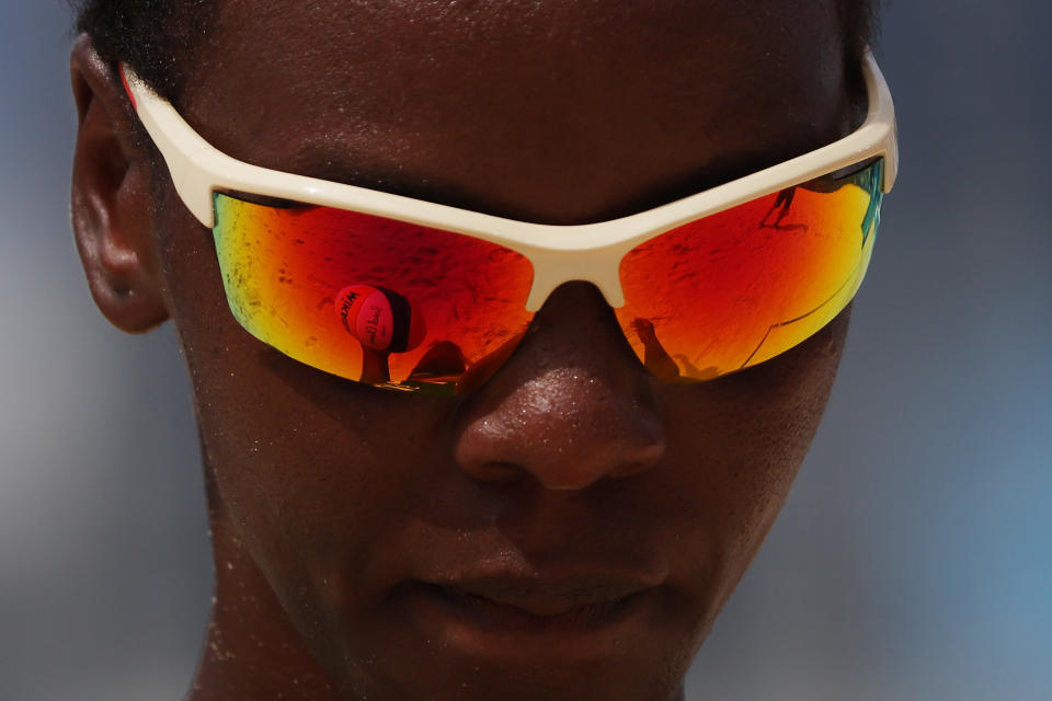<p>Gaudencia Makokha #1 of Team Kenya looks down between plays against Team United States during the Women's Preliminary - Pool D beach volleyball on day six of the Tokyo 2020 Olympic Games at Shiokaze Park on July 29, 2021 in Tokyo, Japan. (Photo by Sean M. Haffey/Getty Images)</p> 
