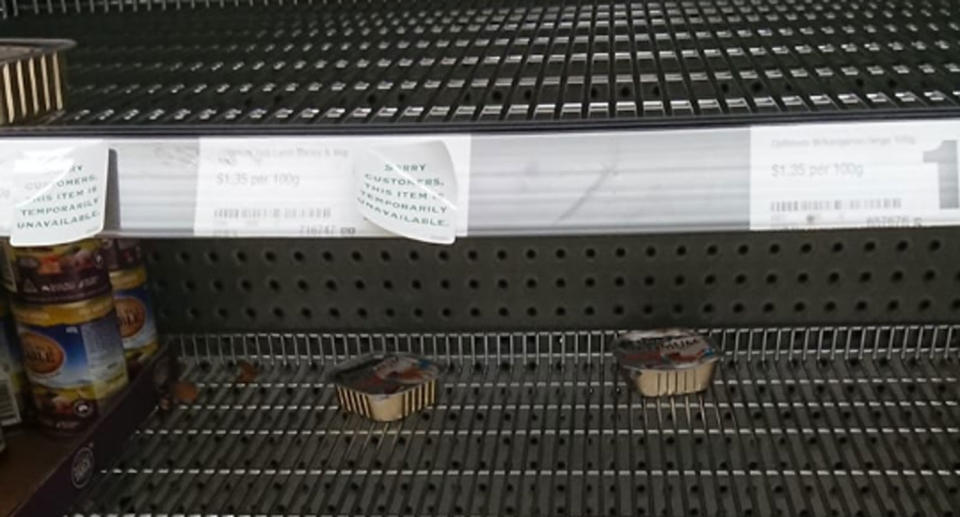 A shelf in Coles. The supermarket said it’s had issues with Mars which supplies the food. Source: Facebook/ Adam Harrison