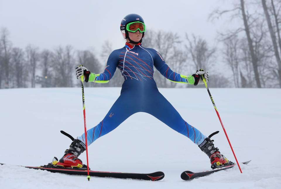 United States' Mikaela Shiffrin stands on the alpine skiing training slopes at the Sochi 2014 Winter Olympics, Monday, Feb. 17, 2014, in Krasnaya Polyana, Russia. (AP Photo/Alessandro Trovati)