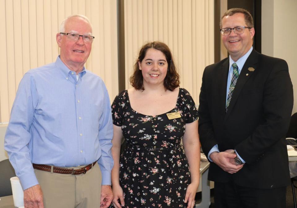 Pictured from the left is SRC Trustee, Jerry Cremer, Outgoing Student Trustee Mary Toothaker and SRC President Curt Oldfield. Toothaker was recognized by the Board for her service during the past year during the board meeting held May 4.