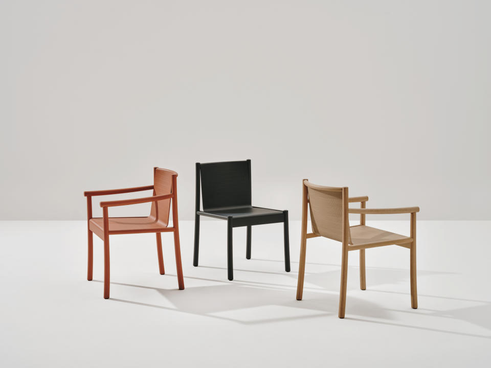 Milan Design Week Arper Kata chairs in wood and black, tan and red fabric