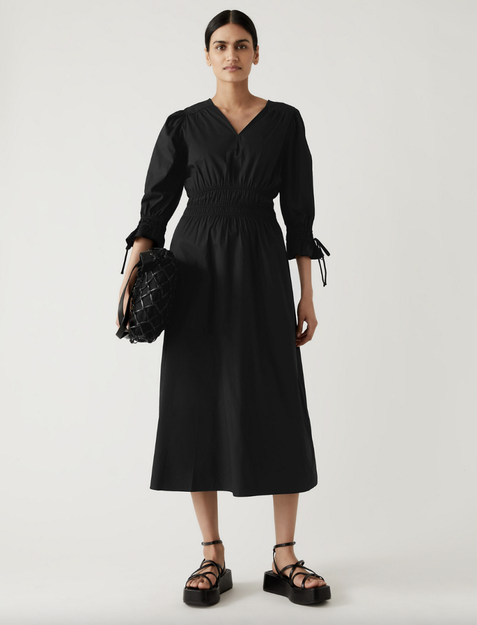 This midi black dress loved by Holly Willoughby is available in sizes 6 to 24. (Marks & Spencer)