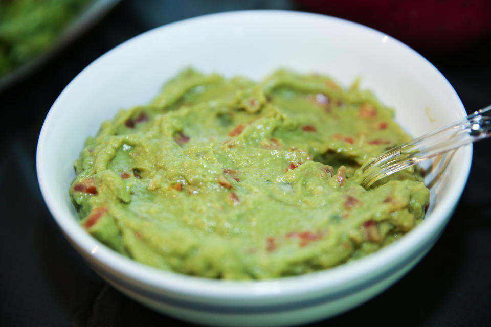 A bowl of guacamole.