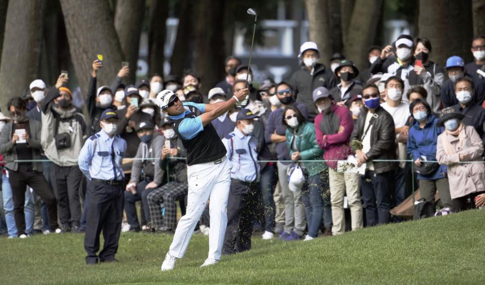 Japanese golfer Hideki Matsuyama plays a shot during the PGA Tour’s Zozo Championship on Narashino Country Club course in Chiba, east of Tokyo, Thursday, Oct, 21, 2021. (Kyodo News via AP)