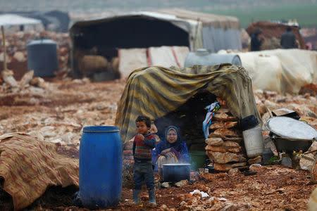 Displaced Syrians are pictured at Kelbit refugee camp, near the Syrian-Turkish border, in Idlib province, Syria January 17, 2018. REUTERS/Osman Orsal