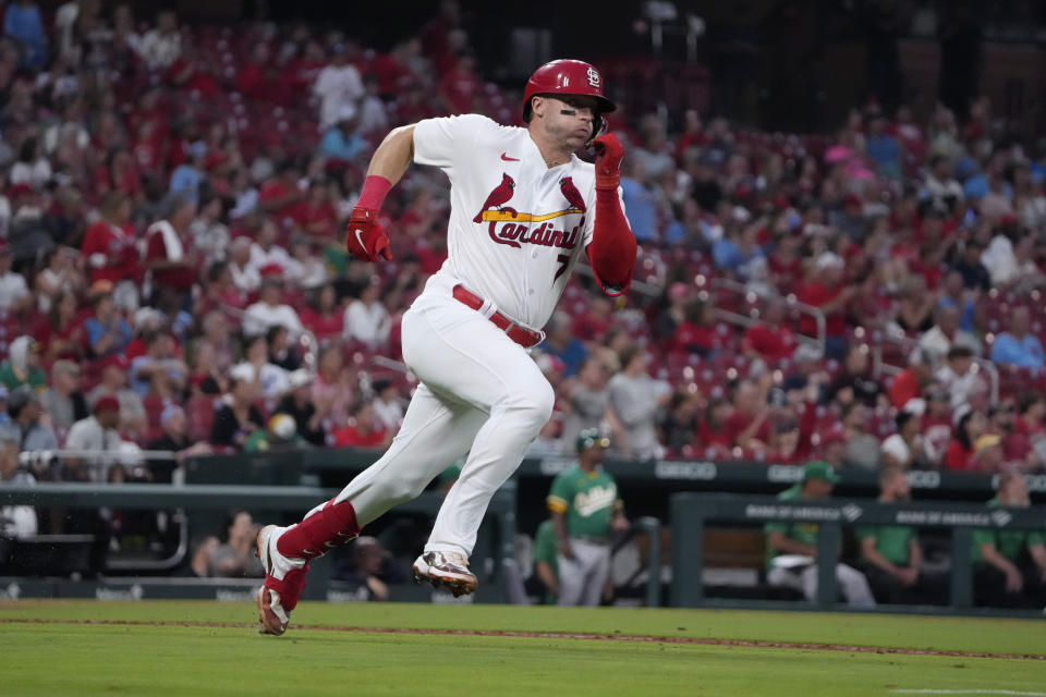 St. Louis Cardinals' Andrew Knizner rounds first on his way to an RBI double during the fourth inning of a baseball game against the Oakland Athletics Tuesday, Aug. 15, 2023, in St. Louis. (AP Photo/Jeff Roberson)