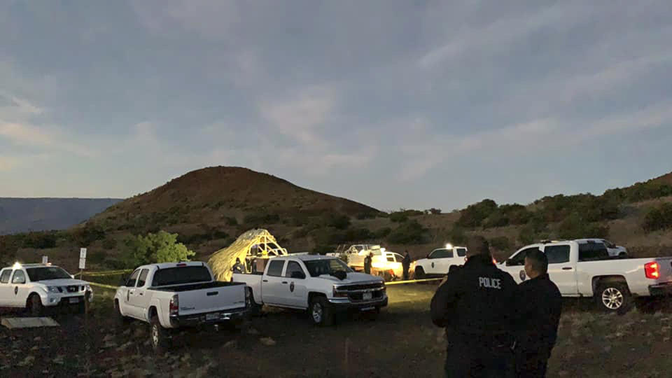 In this photo provided by Pi'ikea Keawekane-Stafford, state and county officials remove Native Hawaiian structures from Mauna Kea, Thursday, June 20, 2019. After years of protests and legal battles, Hawaii officials announced Thursday that a massive telescope which will allow scientists to peer into the most distant reaches of our early universe will be built on a volcano that some consider sacred. The state has issued a "notice to proceed" for the Thirty Meter Telescope project, Gov. David Ige said at a news conference. Ige said four unauthorized structures were removed from the Mauna Kea mountain earlier in the day. (Pi'ikea Keawekane-Stafford via AP)