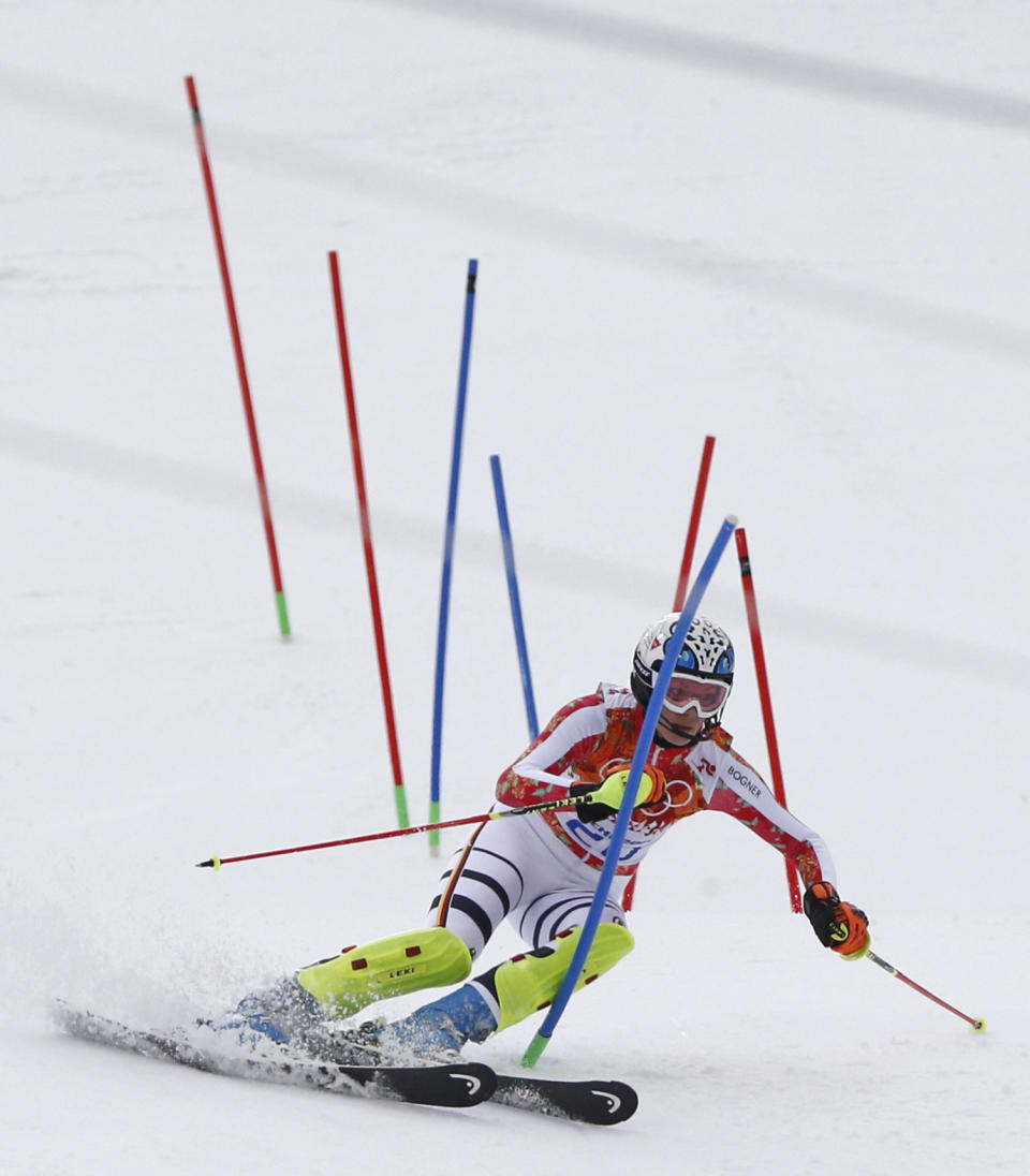 Germany's Maria Hoefl-Riesch skis past the gates during the slalom portion of the women's supercombined at the Sochi 2014 Winter Olympics, Monday, Feb. 10, 2014, in Krasnaya Polyana, Russia. (AP Photo/Christophe Ena)