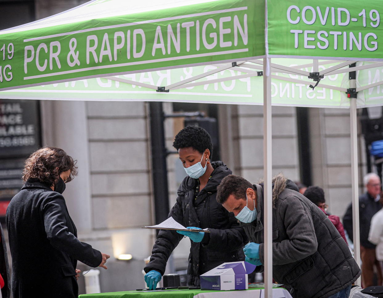 A woman takes a coronavirus test at a pop-up testing site in New York on May 3. 