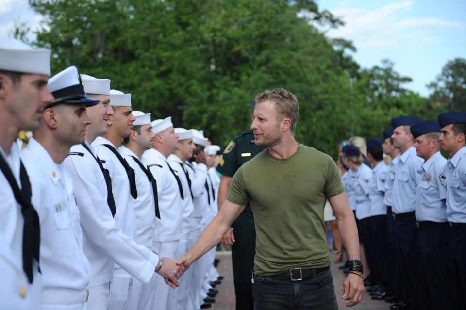 Singer Dierks Bentley chats with sailors who were at the 2013 Players Military Appreciation Day.