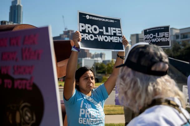 PHOTO: Anti-abortion rights demonstrators protest during a Women's March in Austin, Texas, , Oct. 8, 2022. (Montinique Monroe/Bloomberg via Getty Images)