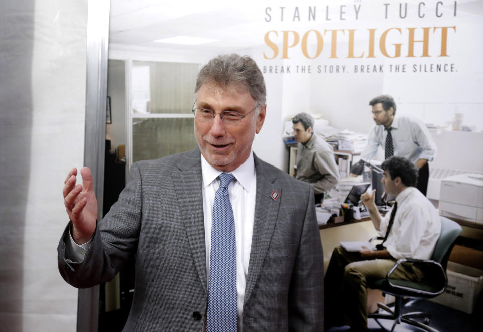 FILE - Marty Baron, former editor of The Boston Globe, walks the red carpet as he attends the Boston area premiere of the film "Spotlight" in Brookline, Mass. on Oct. 28, 2015. Baron, executive editor of The Washington Post and one of the nation's top journalists, says he will retire at the end of February. He took over the Post's newsroom in 2012 after editing the Boston Globe and Miami Herald before that. He was portrayed in the 2015 movie “Spotlight” about the Globe's investigation of the Catholic Church. (AP Photo/Steven Senne, File)
