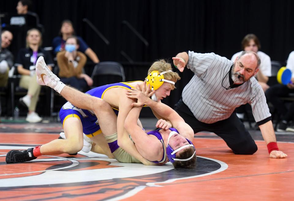 Canton's Ayson Rice and Winner Area's Kaleb Osborn compete during their championship match at the State Wrestling Tournament on Friday, February 25, 2022, at the Denny Sanford Premier Center in Sioux Falls.