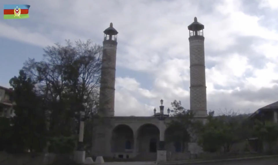 This photo taken from a video released by Azerbaijan's Defense Ministry on Monday, Nov. 9, 2020, shows a view of Yukhari Govhar Agha Mosque in Shushi, in the separatist region of Nagorno-Karabakh. President Ilham Aliyev said Sunday that Azerbaijani forces had taken control of the strategically important city in Nagorno-Karabakh, where fighting with Armenia has raged for over a month. (Azerbaijan's Defense Ministry via AP)