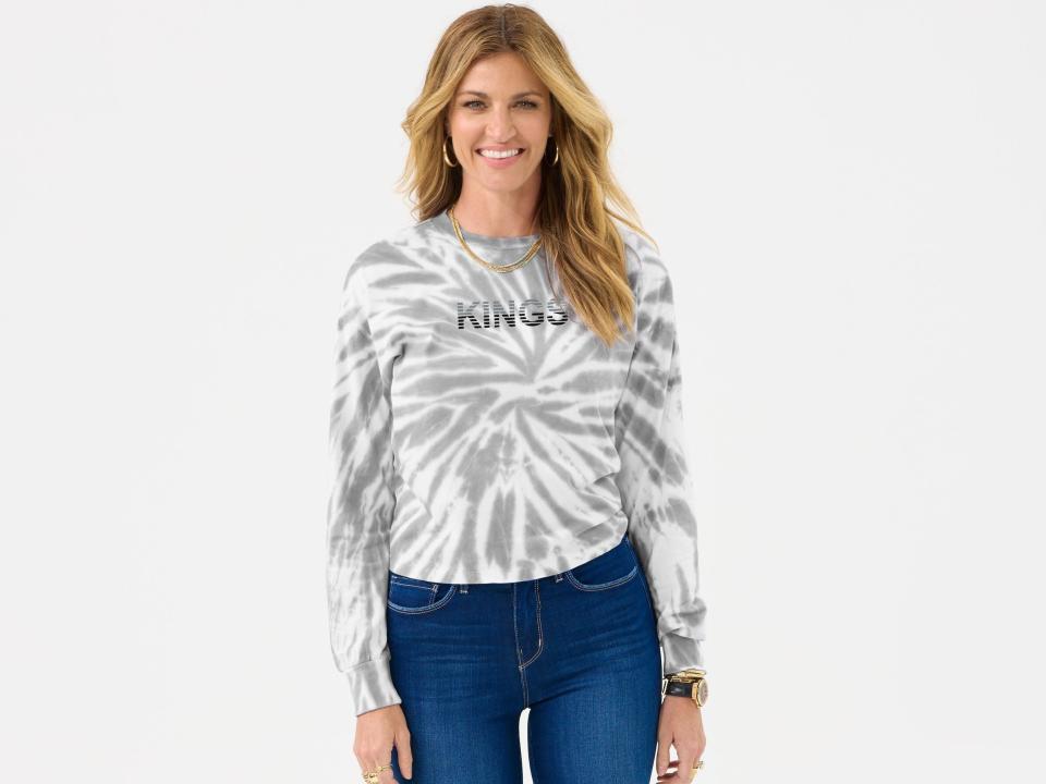 Erin Andrews sports a Los Angeles Kings long-sleeve shirt from her &quot;WEAR by Erin Andrews&quot; clothing line.