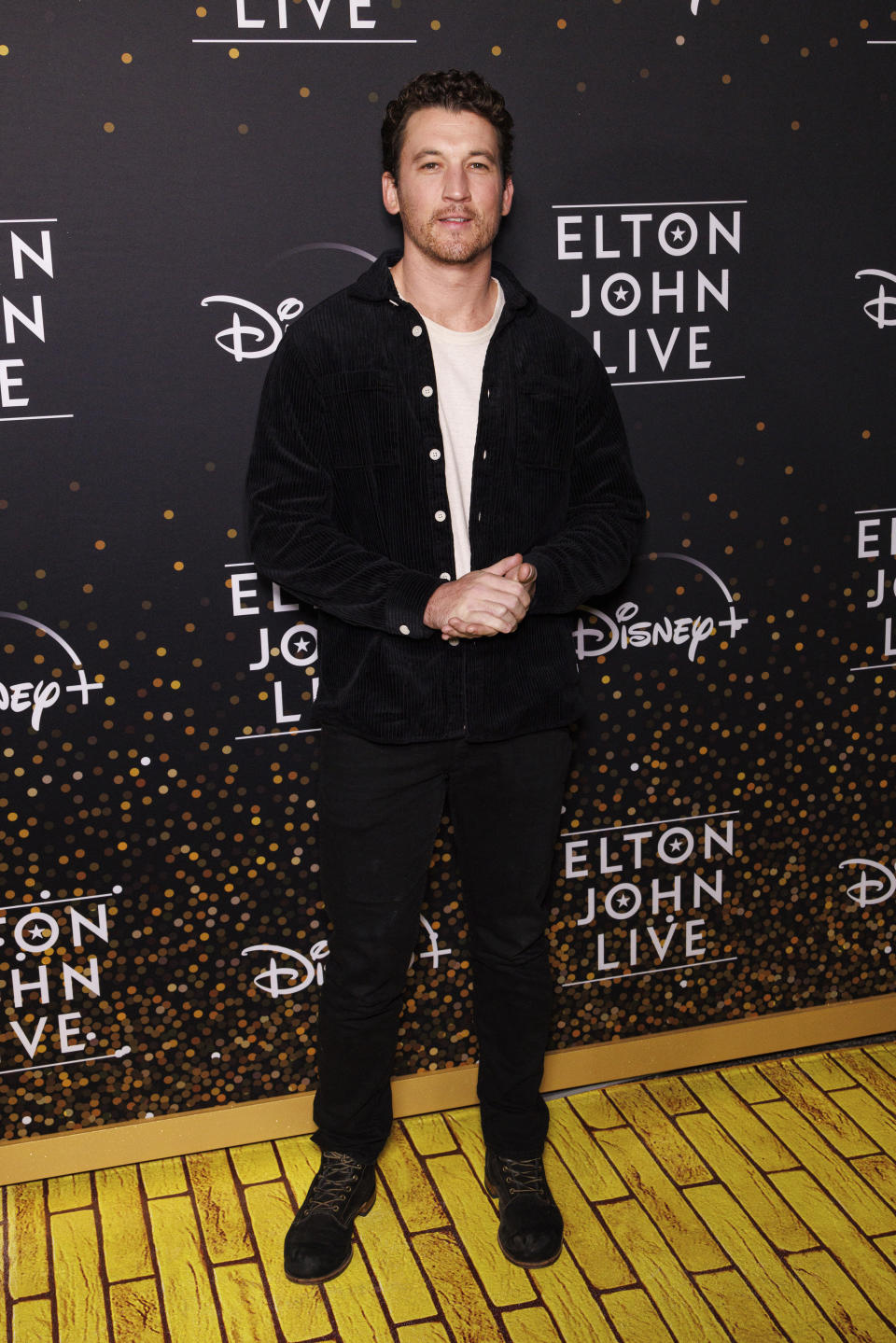 Miles Teller arrives at the Elton John's final North American show of his "Farewell Yellow Brick Road" tour on Sunday, Nov. 20, 2022, at the Dodger Stadium in Los Angeles. (Photo by Willy Sanjuan/Invision/AP)