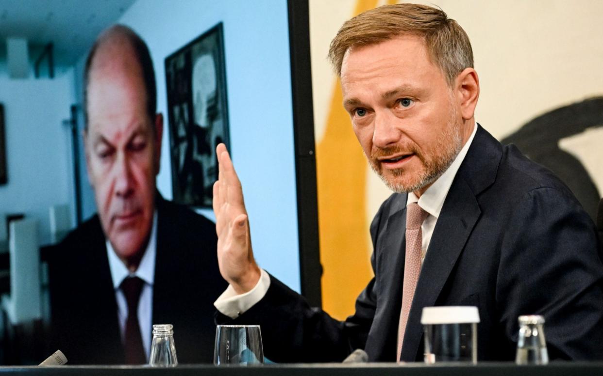 German finance minister Christian Lindner inflation energy bills bailout UK tax cuts - FILIP SINGER/EPA-EFE/Shutterstock