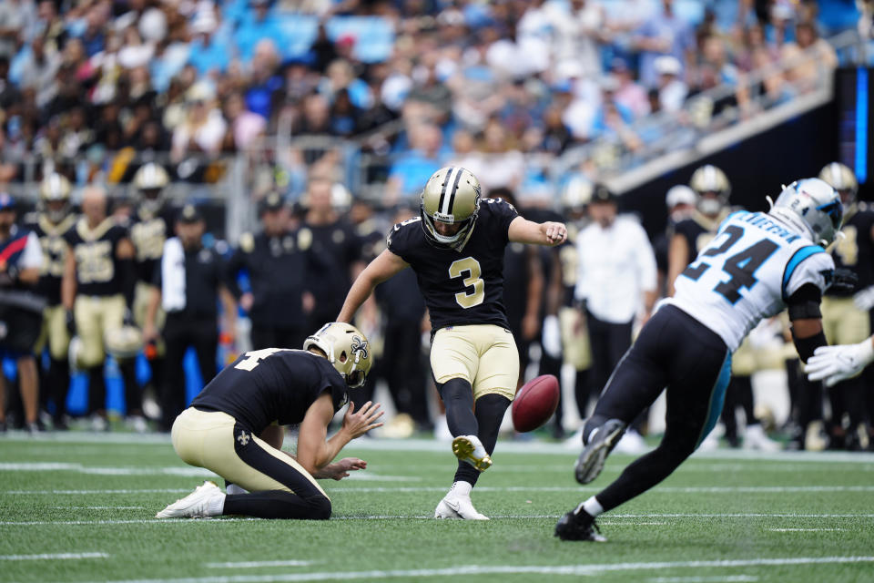 New Orleans Saints place kicker Wil Lutz (3) kicks a field goal during the first half of an NFL football game against the Carolina Panthers, Sunday, Sept. 25, 2022, in Charlotte, N.C. (AP Photo/Jacob Kupferman)