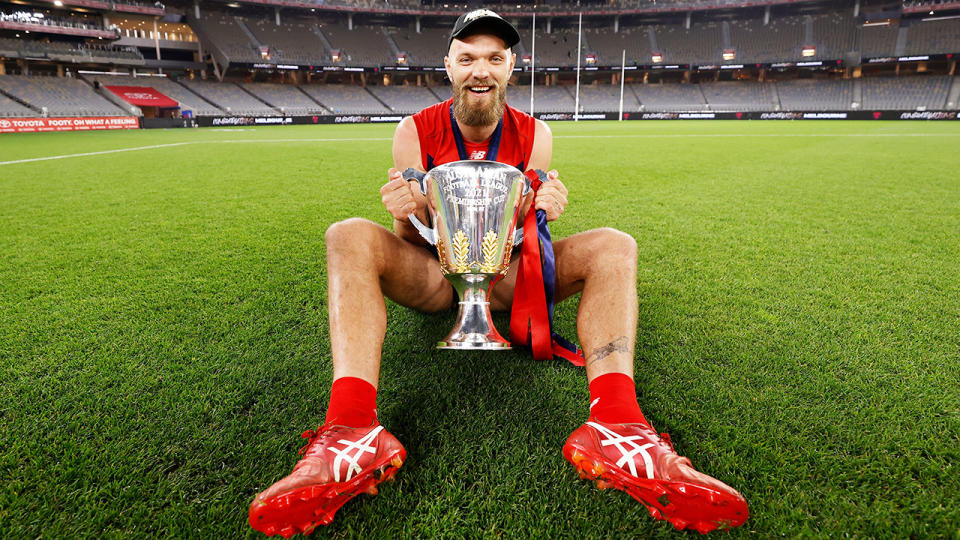 Max Gawn, pictured here celebrating with the premiership cup after the AFL grand final.