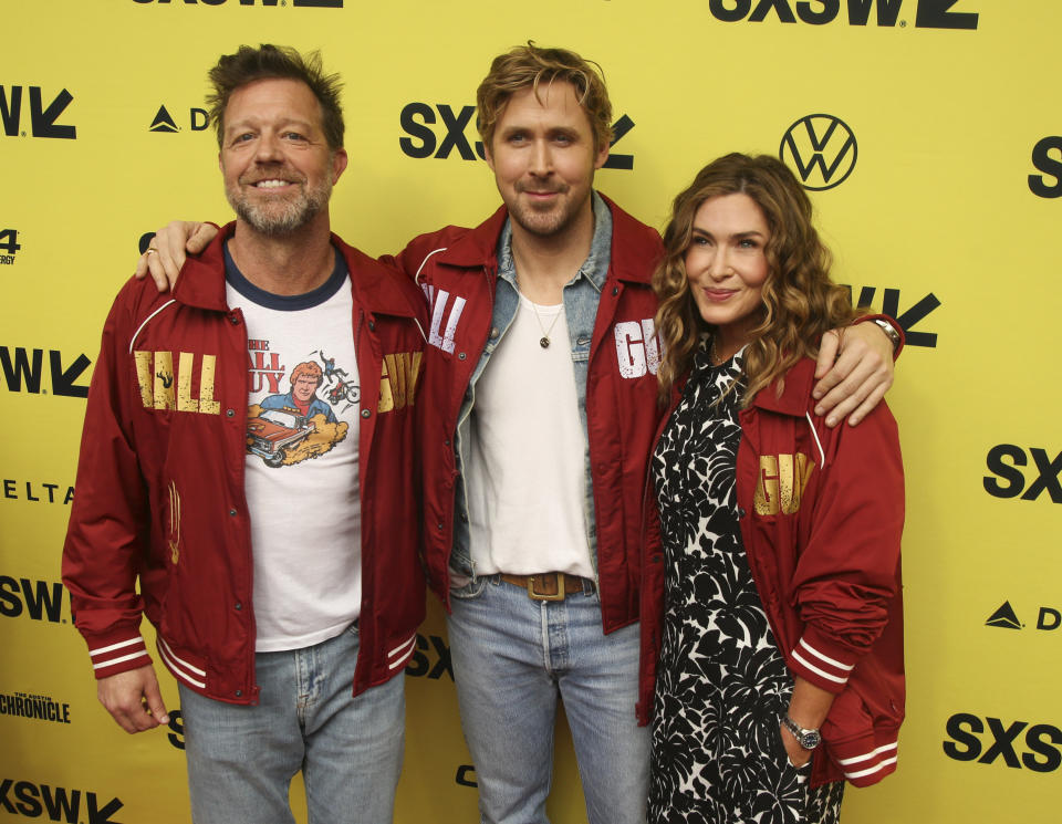 Director David Leitch, from left, Ryan Gosling and Kelly McCormick, arrive for the world premiere of "The Fall Guy" at the Paramount Theatre during the South by Southwest Film Festival on Tuesday, March 12, 2024, in Austin, Texas. (Photo by Jack Plunkett/Invision/AP)