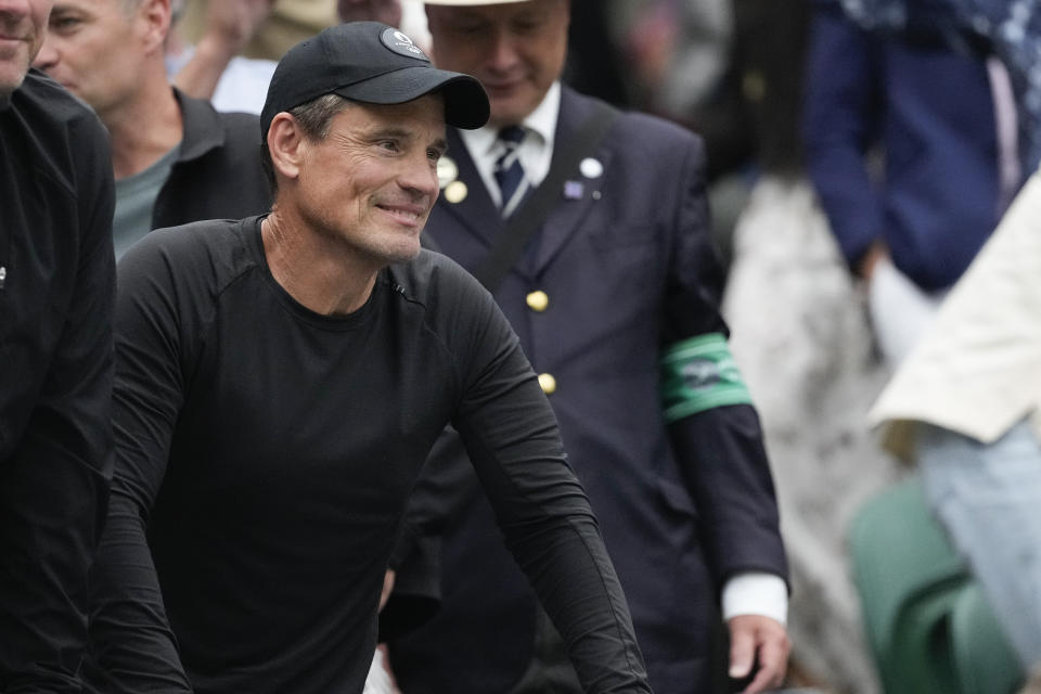 Ben Navarro, father of Emma Navarro of the United States reacts after watching her second round match against Naomi Osaka of Japan at the Wimbledon tennis championships in London, Wednesday, July 3, 2024. (AP Photo/Alberto Pezzali)