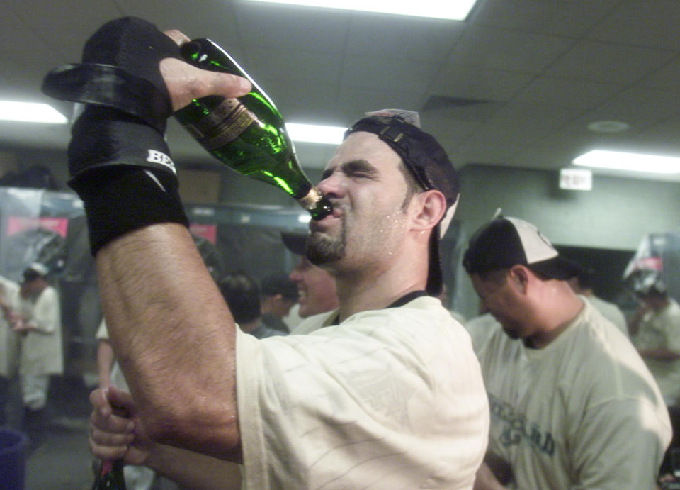 Mike Lowell put together some great memories with the Marlins. (AP Photo)